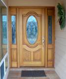 Oval Glass Single Wood Door with 2 sidelights. The glass design variation is not available at this time.